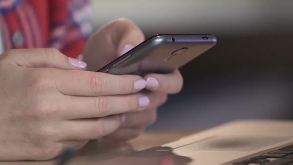 Young Female Hands Scrolling Web Pages on Smartphone, Woman Viewing Social Media