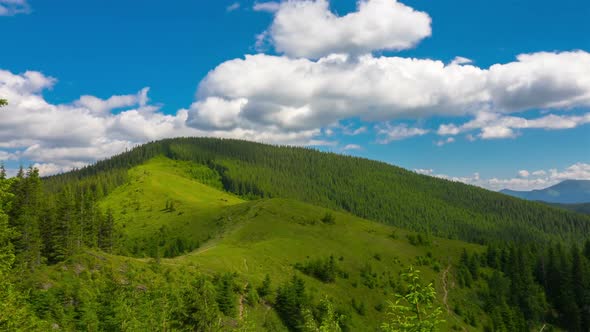 Mountain Landscape with a Fast Clouds and Shadows