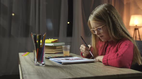 Creative Girl Painting Picture with Colorful Paint alt