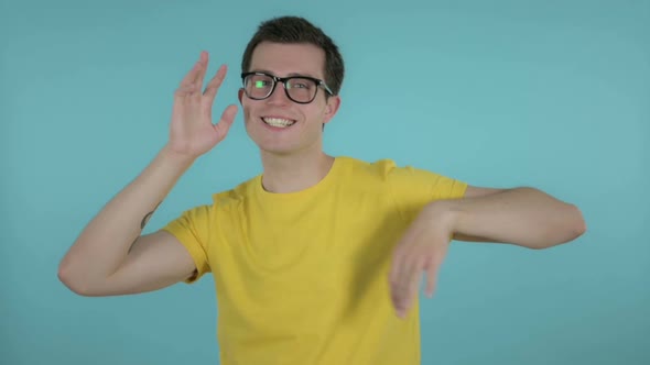 Slow Motion of Man Dancing, Blue Background