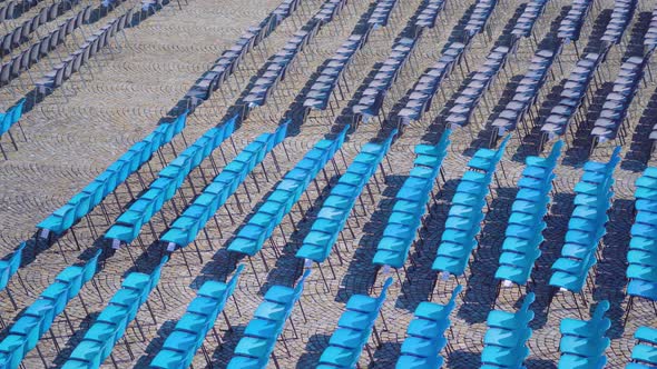 Rows of Blue Seat Chairs for Observation of Local Events