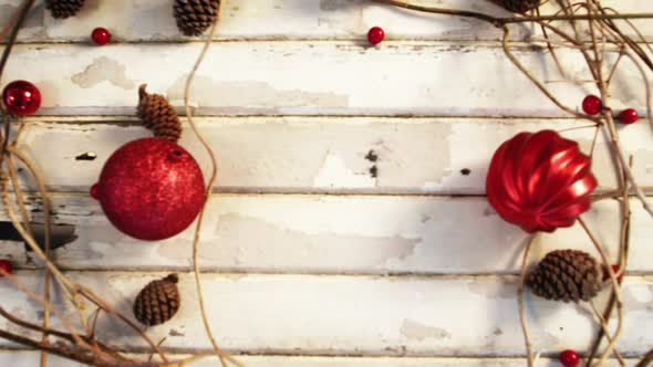 Christmas decorations on wooden plank