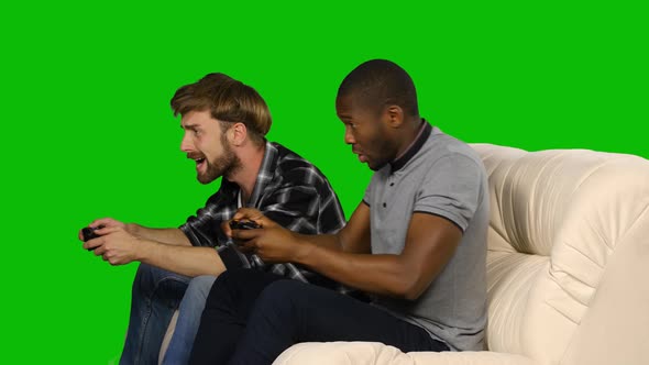 Men Won the Game on the Console. Green Screen