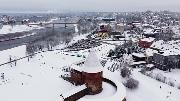 Aerial shot of Kaunas Castle and city skyline in winter season