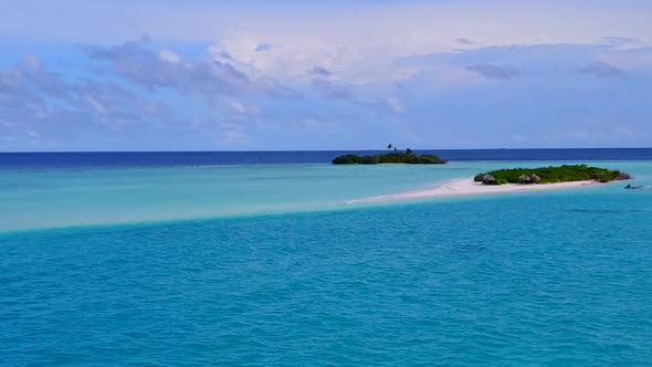 Aerial drone sky of bay beach by blue lagoon and sand background