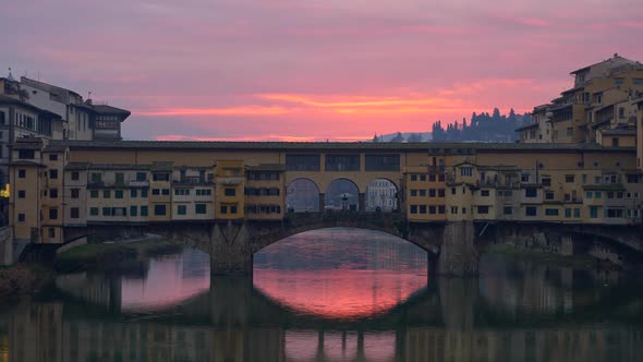 Florence, Italy. The Ponte Vecchio Bridge During Sunrise. Panning Shot, FHD