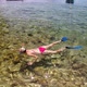 Woman Swimming in Kutlesa Beach of Croatia - VideoHive Item for Sale