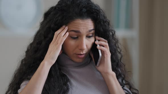 Worried Arabic Hispanic Woman Young Girl Student Businesswoman Talking Mobile Phone Sit at Home