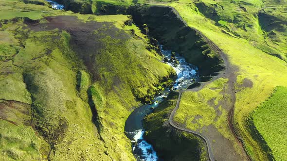 Flying Over the Wild Mountain Skogar River Under the Eyjafjallajokull Volcano in Southern Iceland