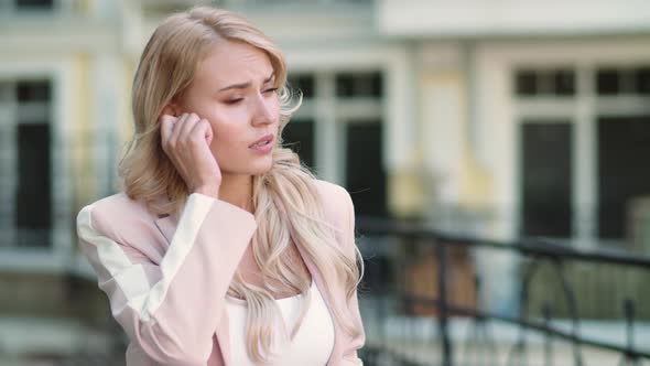 Portrait Woman Talking By Wireless Headset. Girl Using Wireless Earbuds