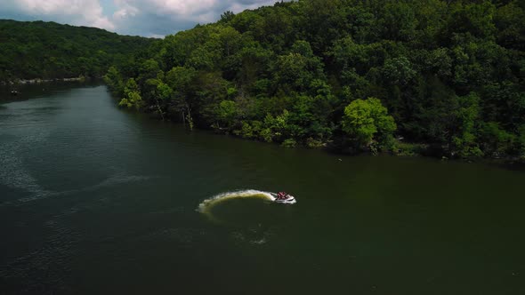 Aerial Photography is an Epic Shot of Jet Ski Racing on a Large River