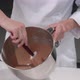 Pastry Chef Kneads the Chocolate Mousse for the Cake - VideoHive Item for Sale