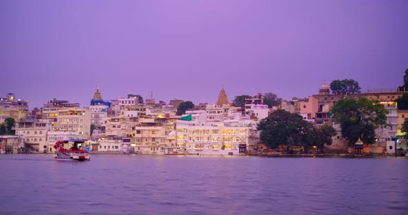 Udaipur Lal Ghat, Houses and City Palace on Bank of Lake Pichola with Water Riffles - Rajput