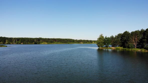 Aerial View. Lake and Green Forest