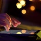 Close up shot of female hand using tablet touching and typing on screen. - VideoHive Item for Sale