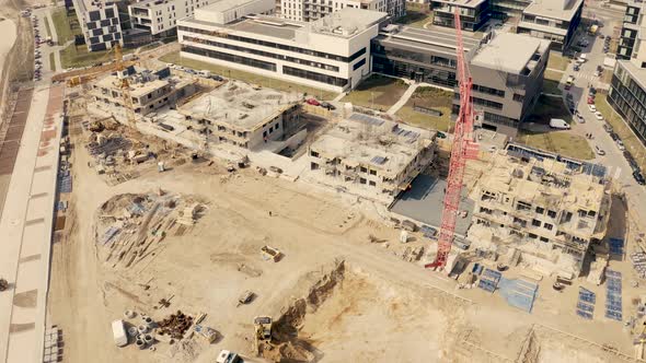 Busy Construction Site and Construction Equipment Aerial.