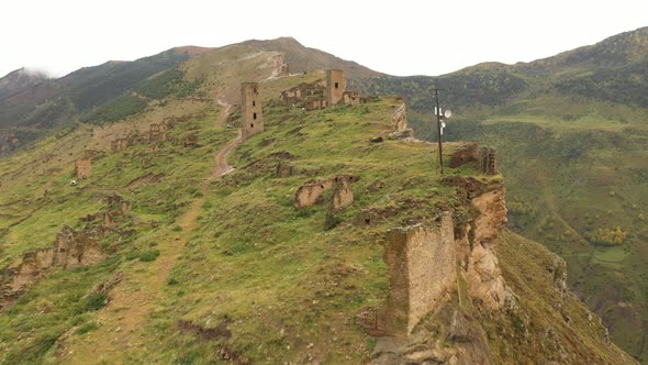 Ancient Towers and Ruins of the Abandoned Village on a Cliff