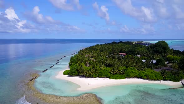 Aerial drone seascape of coastline beach by blue sea with sand background