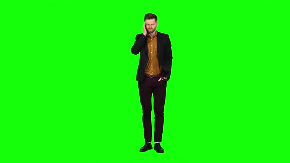 Man Is Suffering, His Head Hurts, He Is Tired. Green Screen