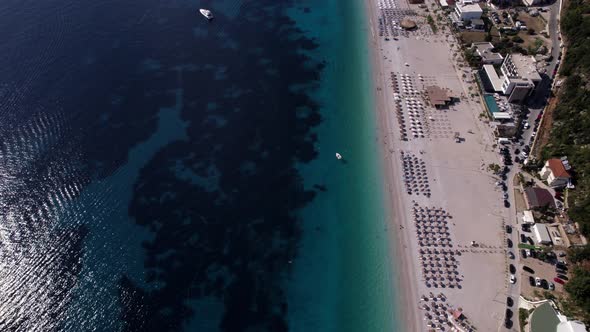 Dhermi, Albania from above. Drone view of a beach with turquoise water.