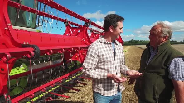 Farmers talking in field