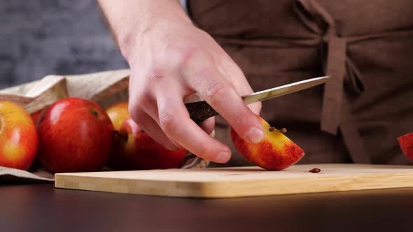 Crop Person Dancing and Cutting Apple