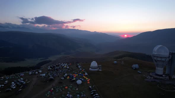 Two Large Telescope Domes at Sunset