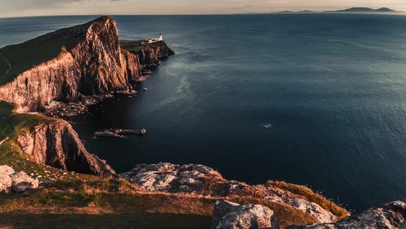 Sunset at Neist point lighthouse in autumn, Scotland, United Kingdom, 4k, timelapse