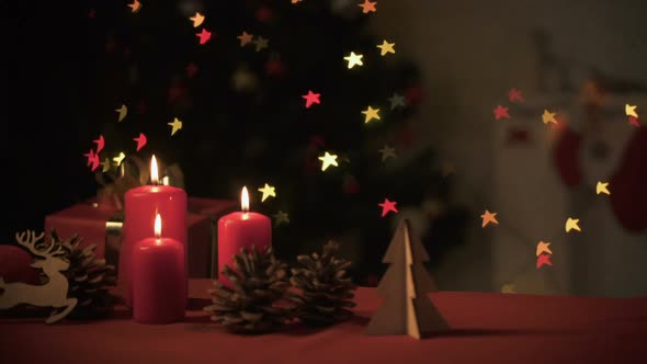 Christmas Decorations Standing Near Sparkling Tree, Preparations for Holiday