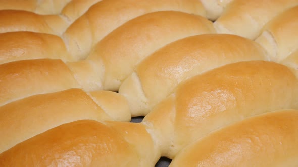 Home baked  fresh crescent rolls  close-up panning 4K 2160p UHD video - Tasty dough crescent rolls  