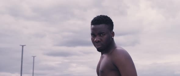 Motivated black man on rooftop