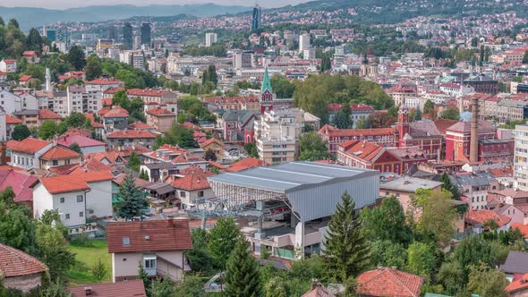 City panorama with cable car moving up and down from Sarajevo station to mountains