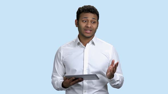 Young Indian Business Man Giving a Presentation