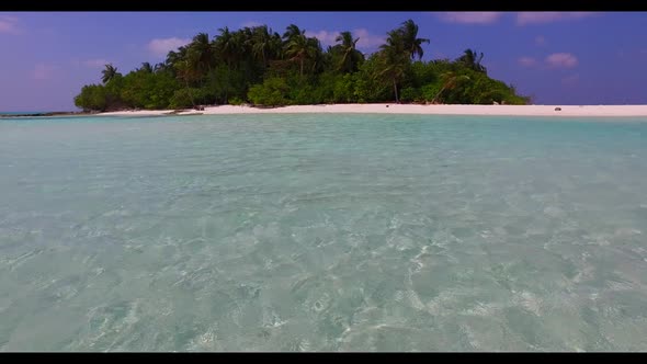 Aerial flying over nature of exotic sea view beach voyage by blue ocean with white sand background o