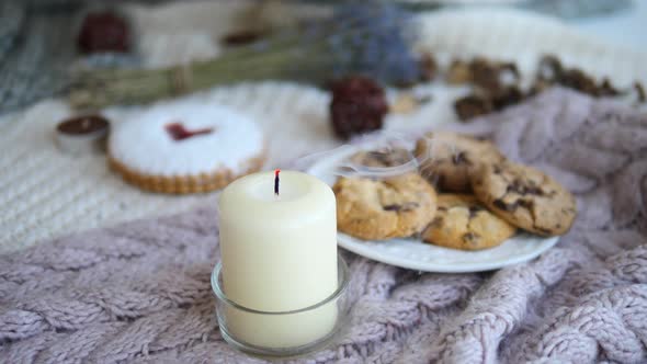 Blowing Out A Candle. Festive Cozy Decorations, Winter Season