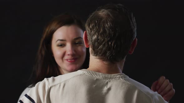 Woman hugging a man with joy