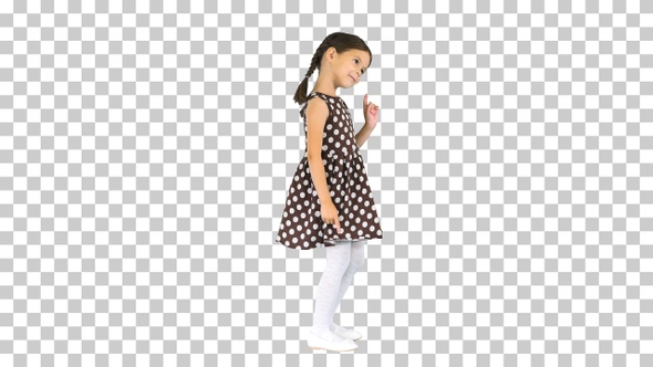 Little girl in polka dot dress dancing, Alpha Channel