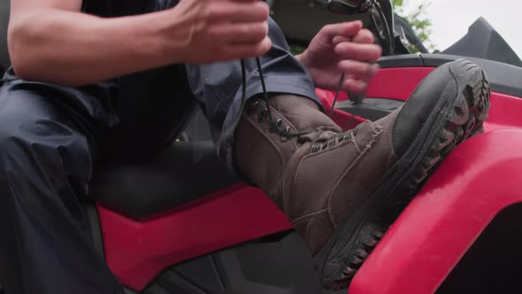 Close Up of Unrecognizable Man Lacing Boots