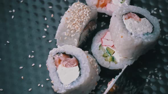 Fresh Sushi Roll With Sesame Seeds Rotate Close Up