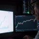 Male Trader Analyzes the Stock Market - VideoHive Item for Sale