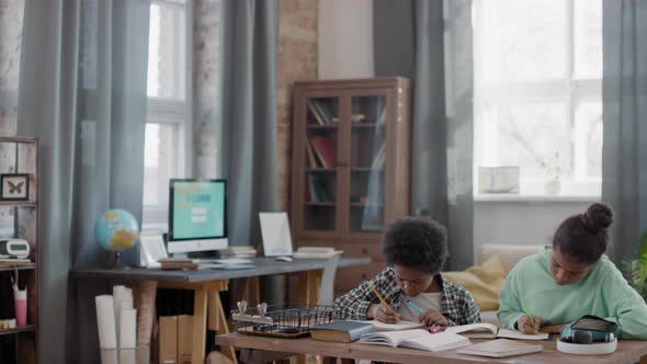 Afro Kids Doing Homework Together