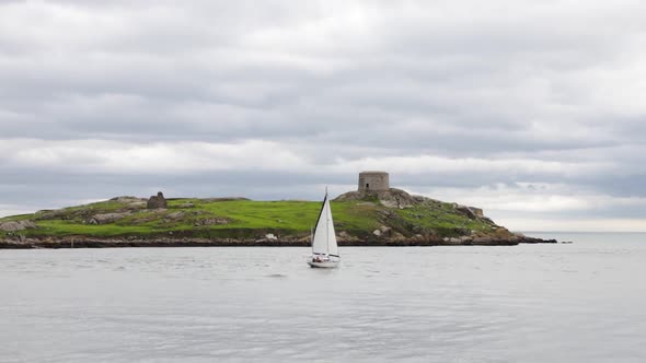 View of The Dalkey Island as a yacht sails by it