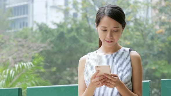 Woman using mobile phone