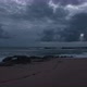 Dusk on beach with moody dark clouds overhead, time lapse - VideoHive Item for Sale