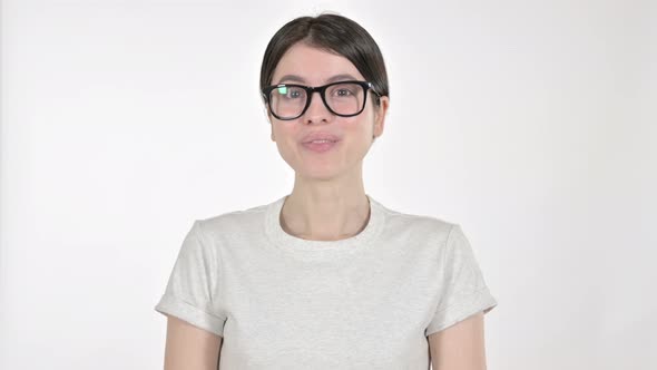 Cheerful Woman Saying Yes with Head Sign on White Background