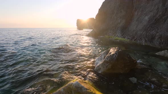 Sea Waves Breaking Against Cliff Viewed From Above