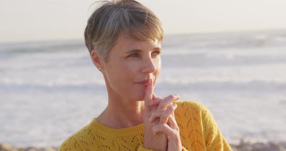 Woman enjoying free time by the sea