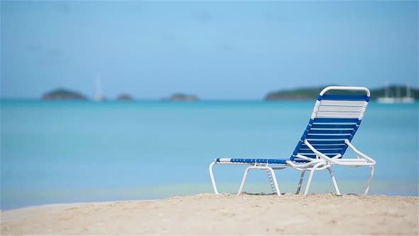 One Sunbed on White Tropical Caribbean Beach