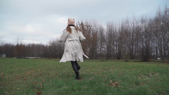 Girl Runs Across the Field