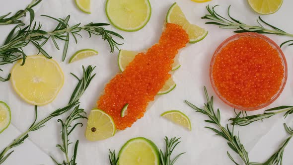 Sandwiches with salmon caviar salted roe.  Caviar on bread toast rotating close-up slow motion
